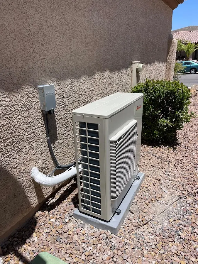 Residential air conditioning condenser unit in Defiance